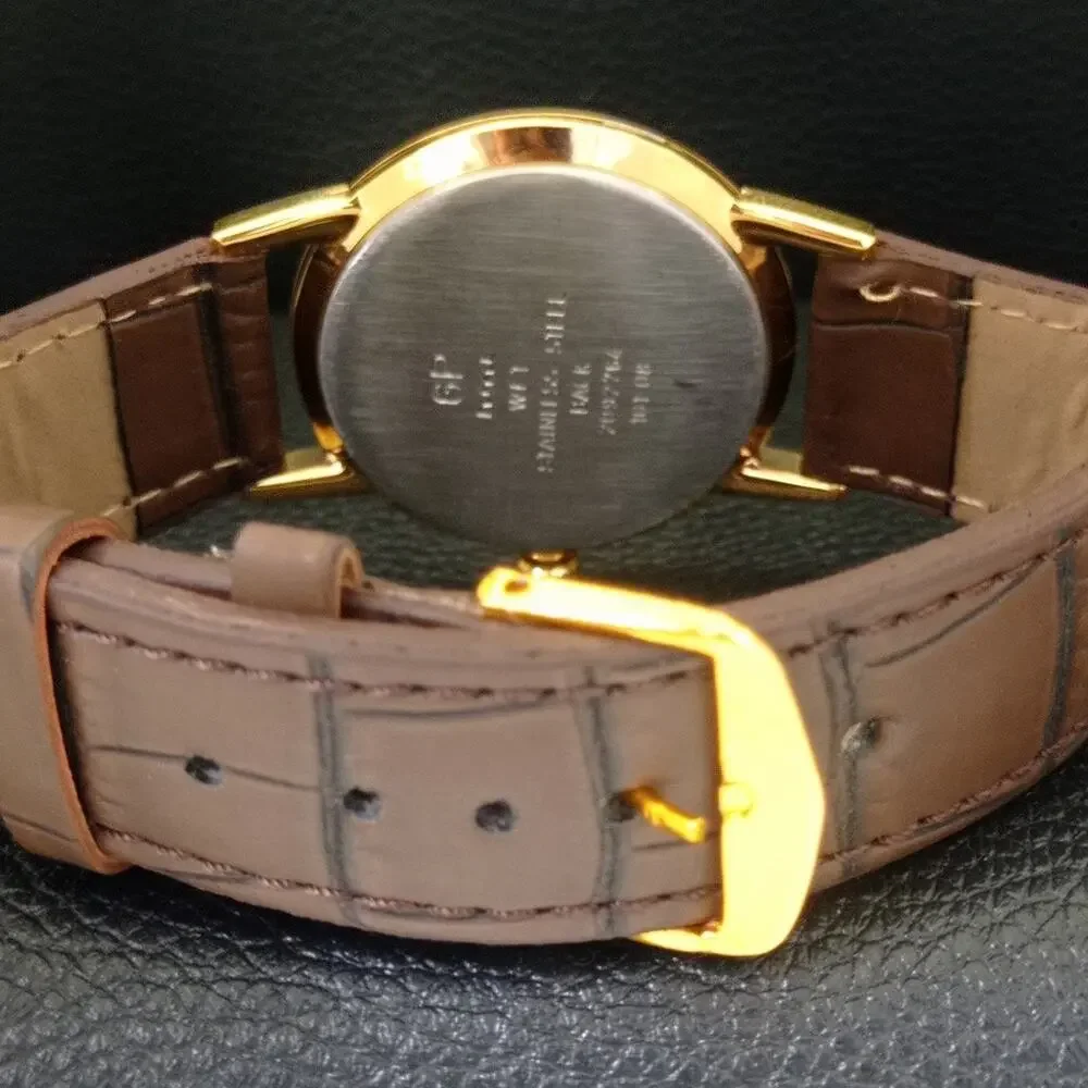 Vintage 1981 HMT Manual Wound Mens Gold Watch W/daydate & White accents